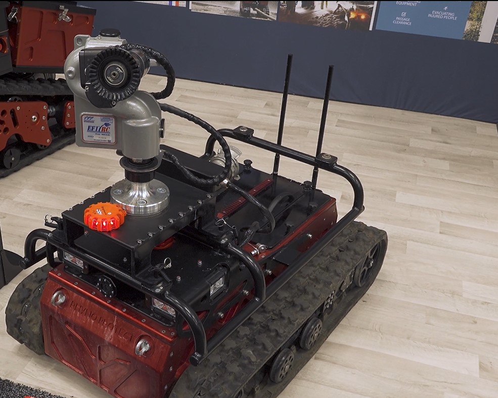 A shark Robotics Firefighting Vehicle with a TFT EF1 monitor mounted on top