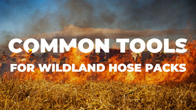 A wildland fire burns. White text says "common tools for wildland hose packs"