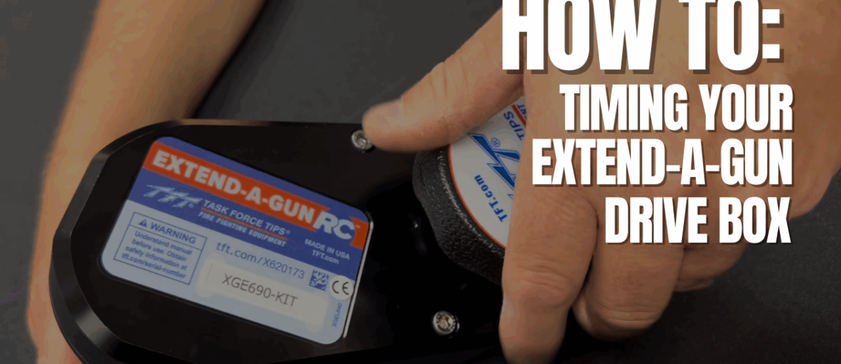 Hands holding the gearbox for an RC Extend-A-Gun. Text reads How To: Timing Your Extend-A-Gun Drive Box
