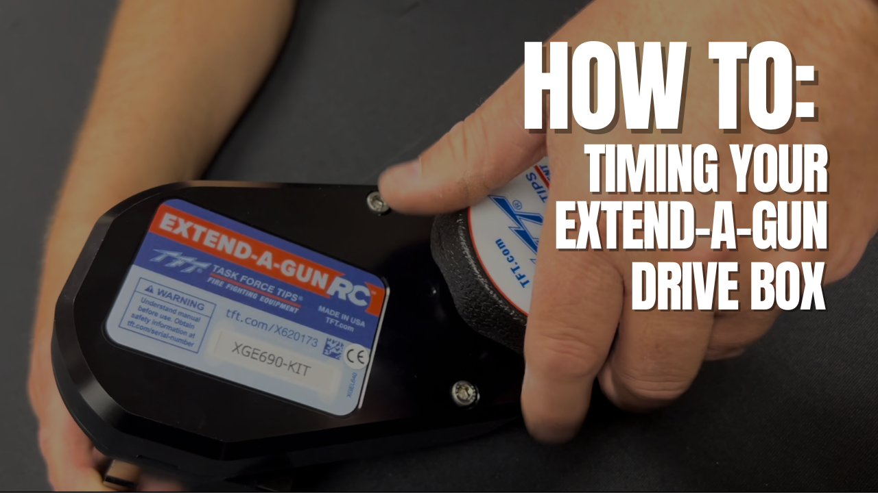Hands holding the gearbox for an RC Extend-A-Gun. Text reads How To: Timing Your Extend-A-Gun Drive Box